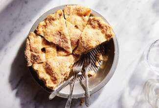 Apple pie, sliced in the pie plate