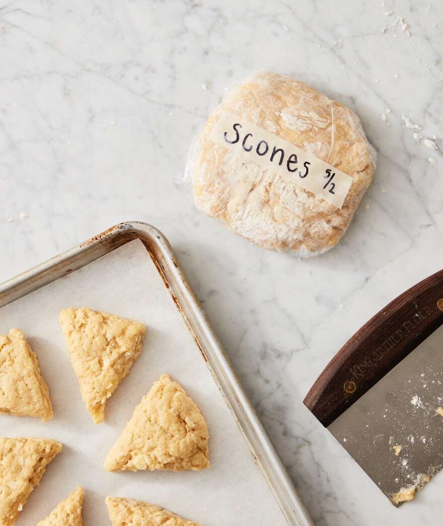 Scone dough plastic-wrapped and labeled for freezing